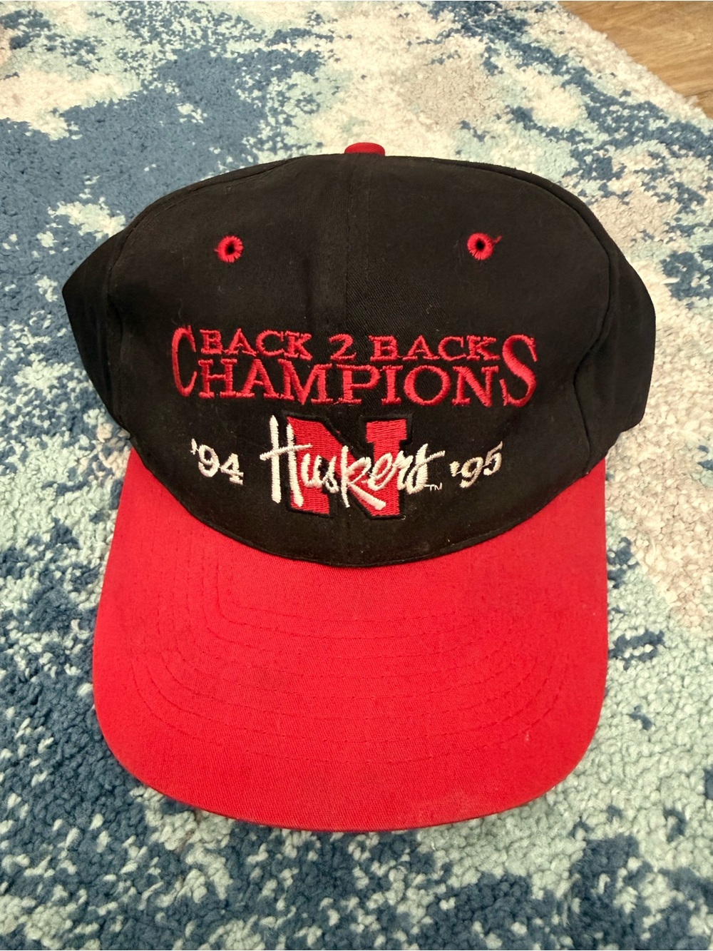 Back 2 Back Champions '94-'95 Huskers Red & Black Cap